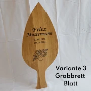Grabbrett (statt einem Grabkreuz)